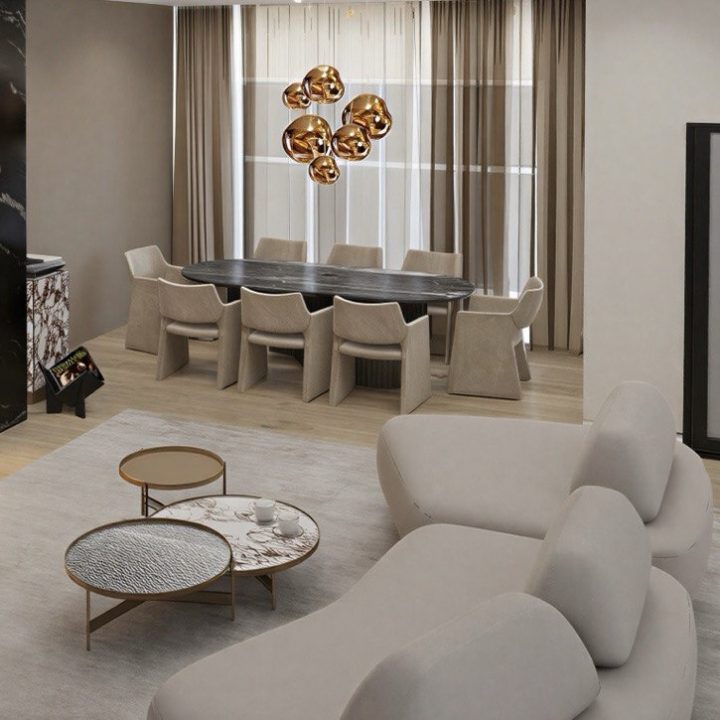 Modern dining area with marble top table, curved reeded base, and eight ultramodern dining chairs