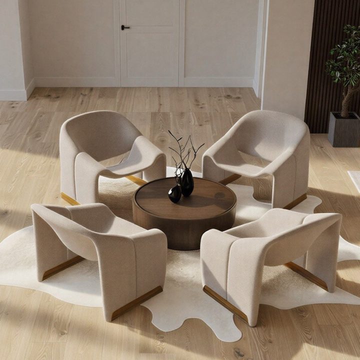 Modern secondary sitting area with four ultramodern chairs and wood drum table in neutral tones.