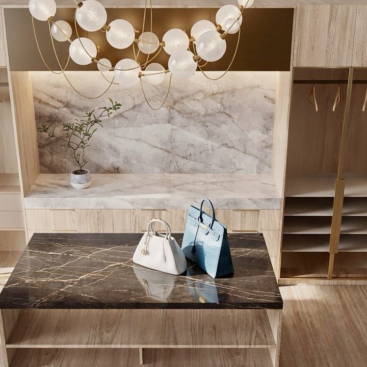 Custom closet island with Cosentino Laurent countertop and integrated storage in modern Atlanta walk-in closet