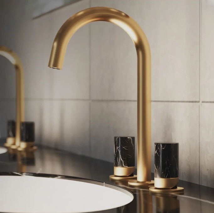 Luxury Bathroom Design featuring brass Rohl faucet with black marble knobs